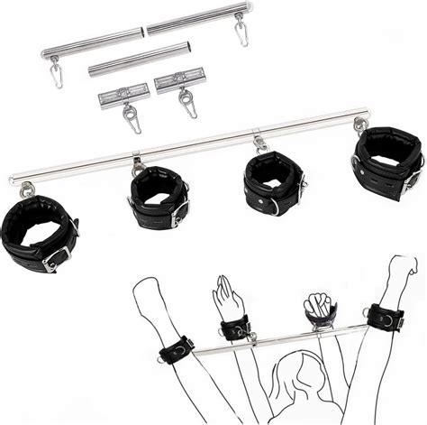 Explore a variety of kinky sex positions and bondage at the same time with Adam & Eve’s versatile Scarlet Couture Spreader Bar! The bar features 2 pairs of built-in cuffs for use in a wide variety of bondage positions, including standing doggy, leg-spread oral & more. It's ideal for deeper penetration and more stimulating play.